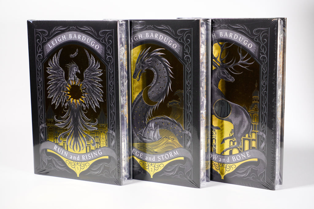 Front covers of the LitJoy editions of Shadow and Bone, Siege and Storm, and Ruin and Rising