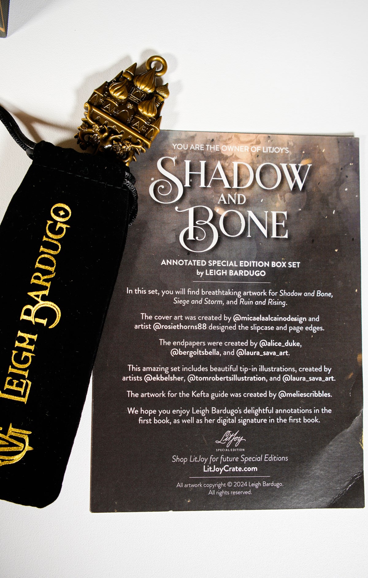 LitJoy Little Palace preorder key in velvet bag with the Shadow and Bone set information card