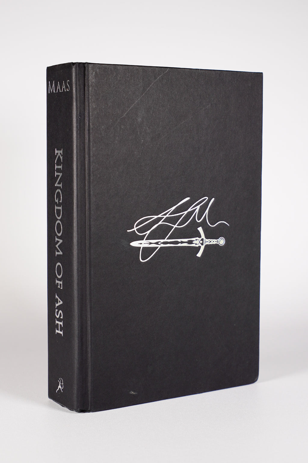 Kingdom of Ash naked hardcover beneath the dust jacket from the 2018 Throne of Glass box set