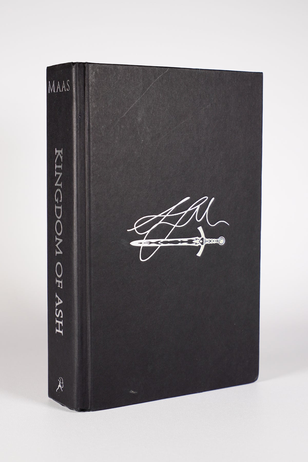 Kingdom of Ash naked hardcover beneath the dust jacket from the 2018 Throne of Glass box set