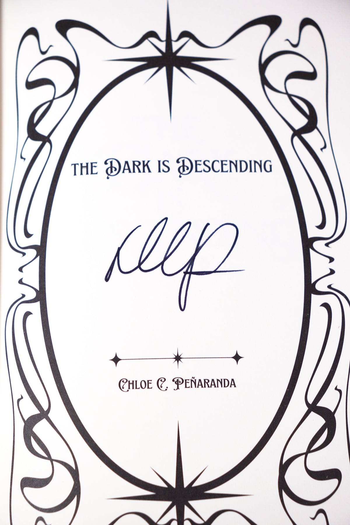 The Dark Is Descending hand-signed title page in the OwlCrate Nytefall set