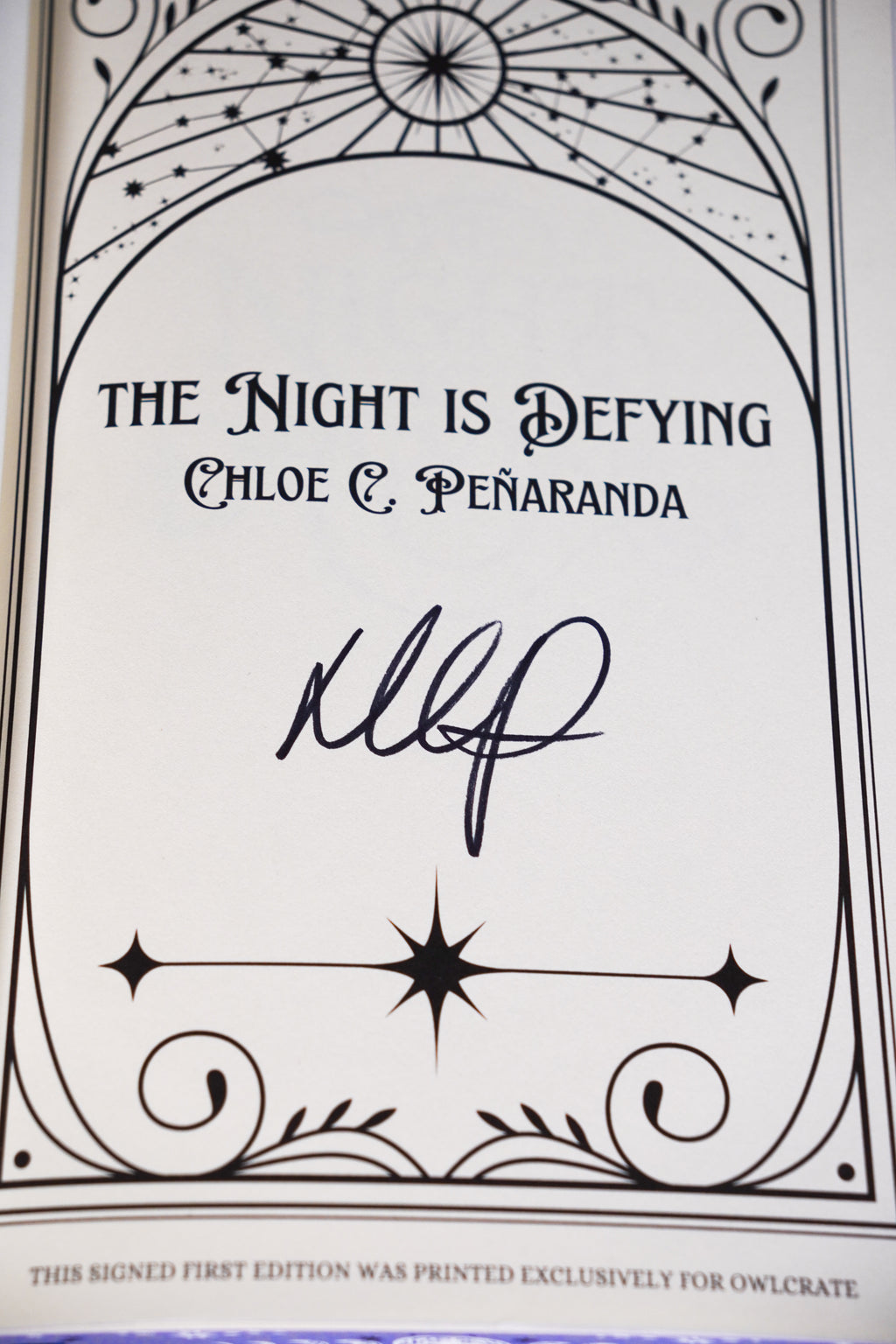 The Night Is Defying hand-signed title page in the OwlCrate Nytefall set