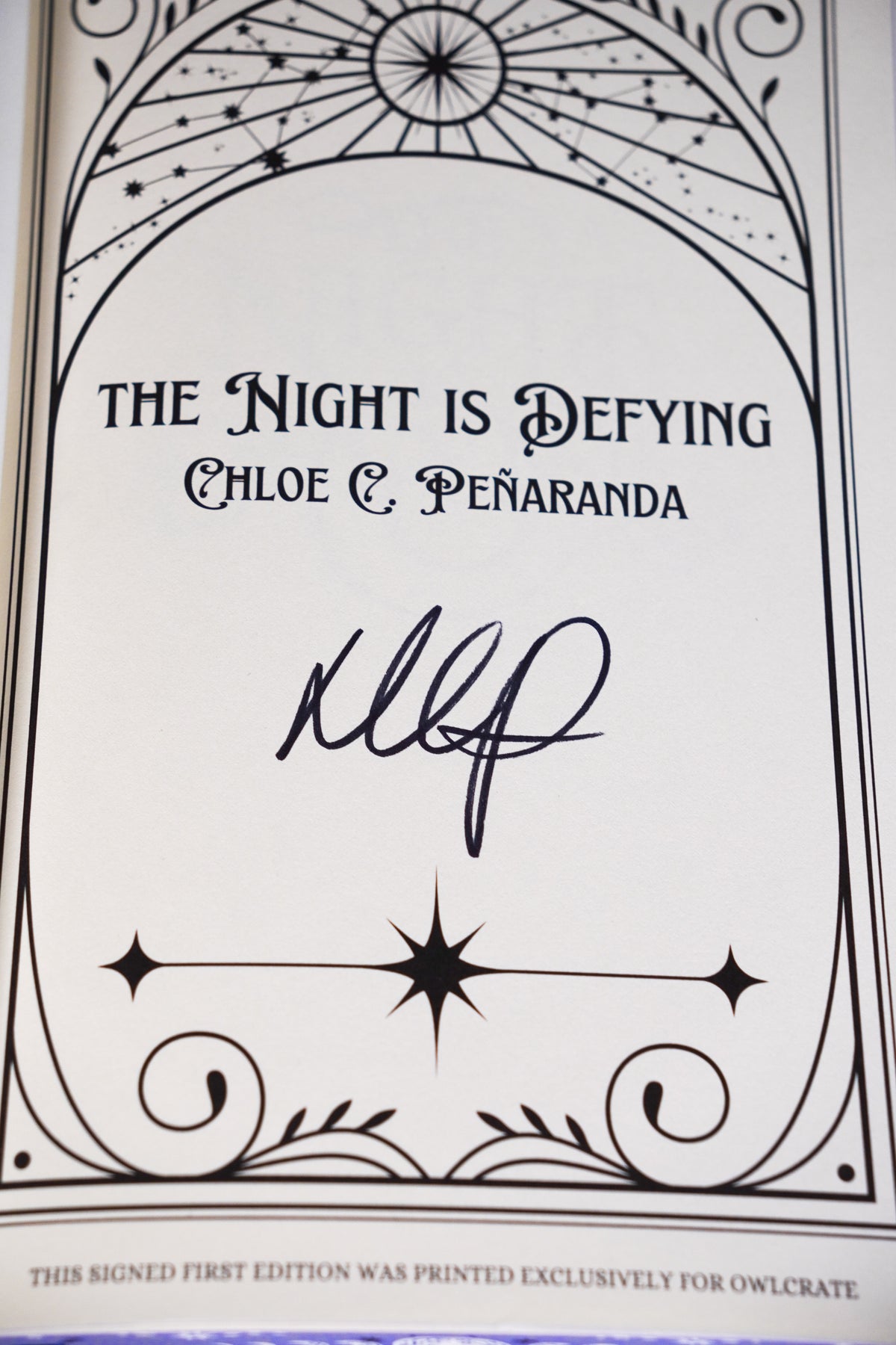 The Night Is Defying hand-signed title page in the OwlCrate Nytefall set