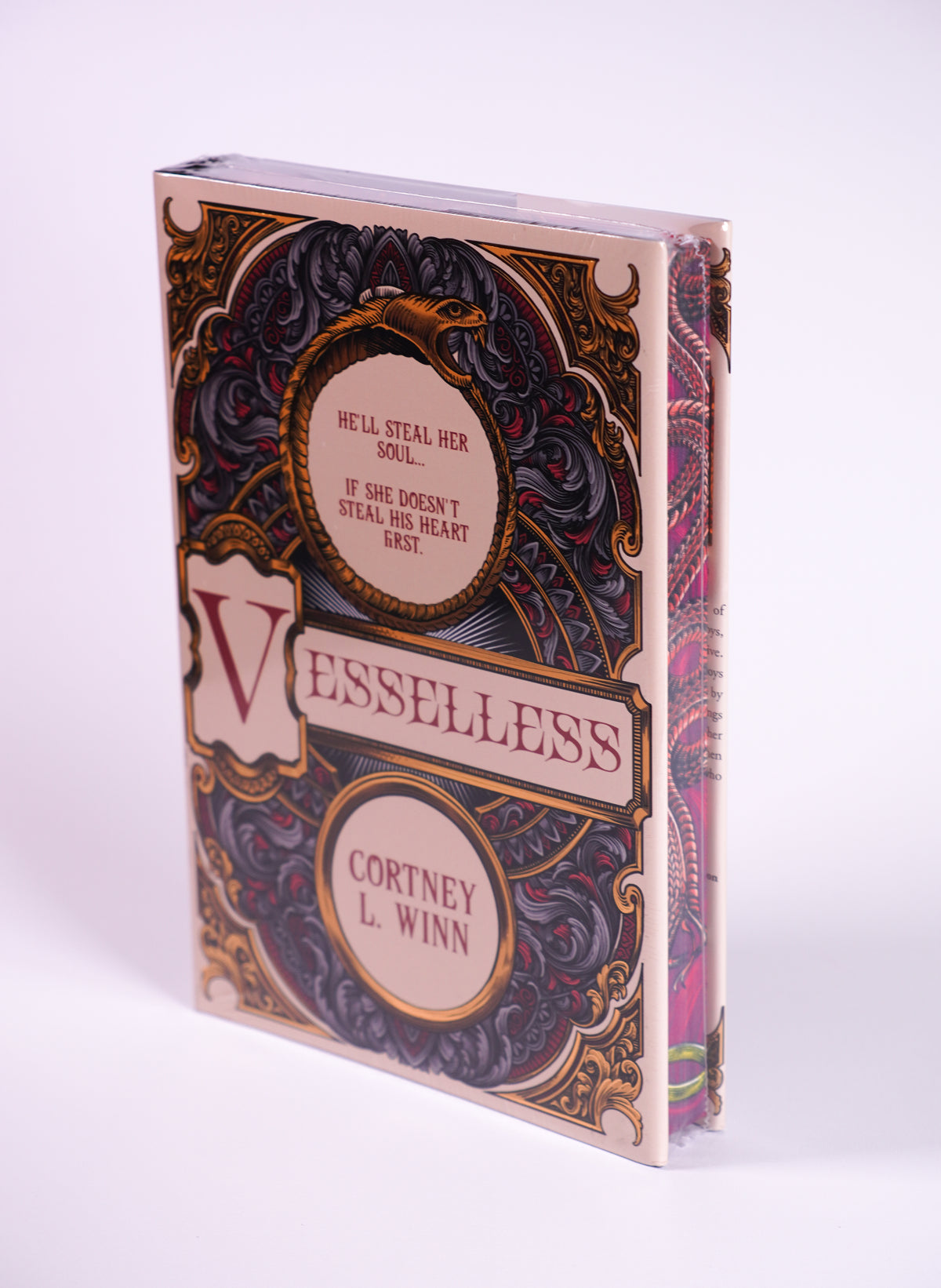 Vesselless by Cortney L. Winn — front cover and decorated fore-edge, in plastic wrap