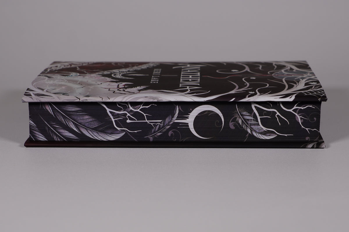 Anathema LitHaven decorated fore-edge with feather and crescent design