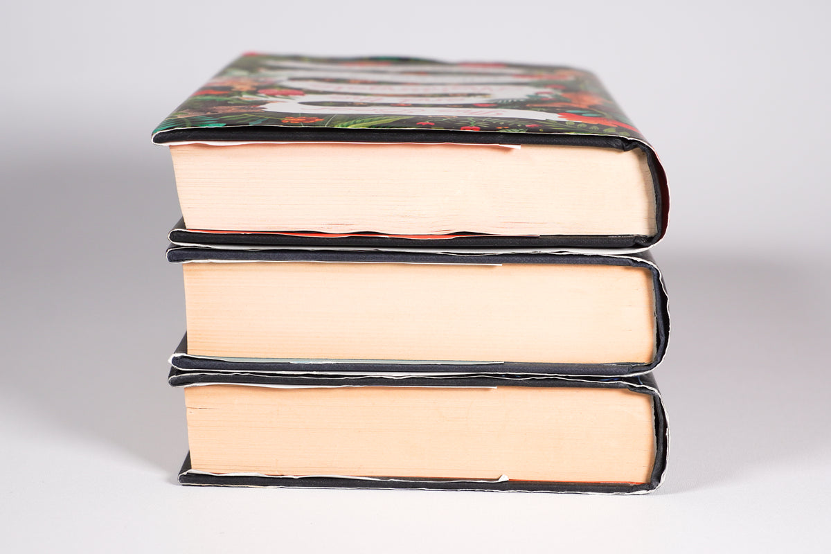 Winternight Trilogy hardcover set showing fore-edges and dust-jacket wear