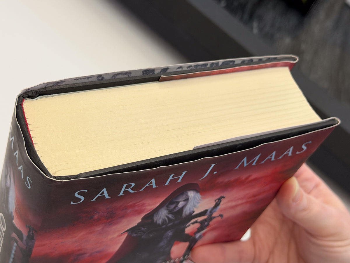 Queen of Shadows hardcover showing top page edge and dust-jacket edge