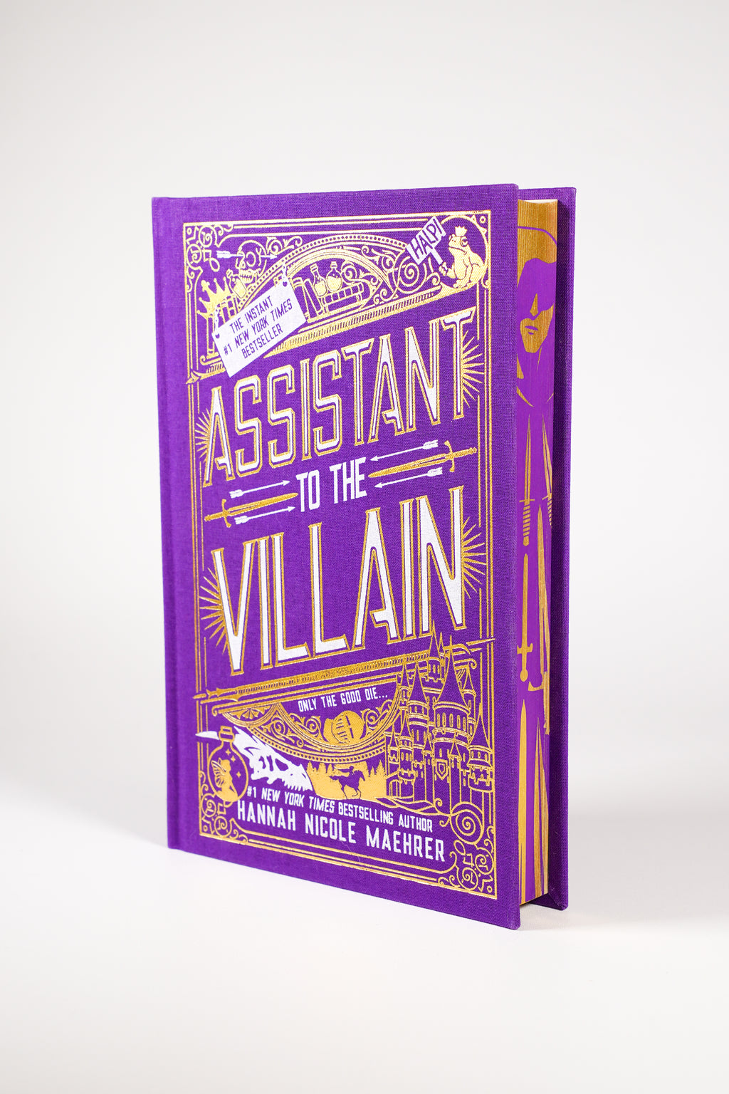 Assistant to the Villain Clothbound Edition purple and gold hardcover front