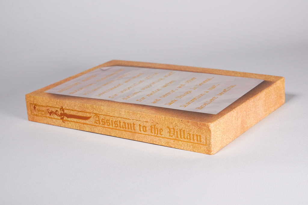 Bottom and side quote panel on the Assistant to the Villain Bookish Box Luxe slipcase