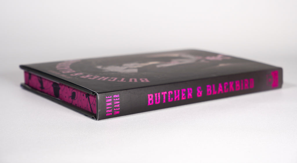 Spine and decorative page-edge view of Butcher and Blackbird