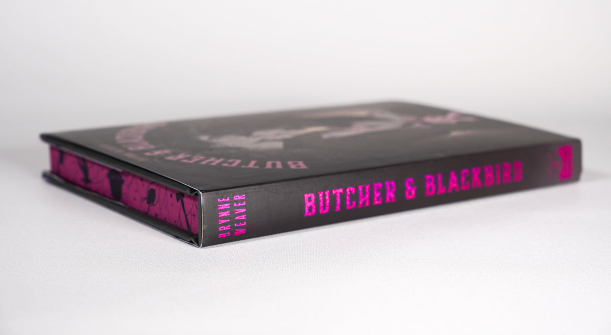 Spine and decorative page-edge view of Butcher and Blackbird
