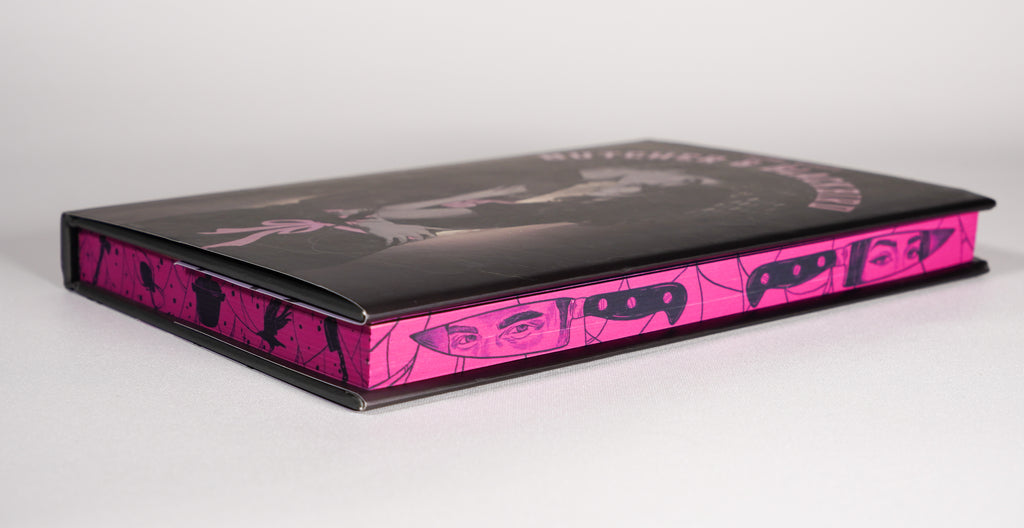 Pink stenciled fore edge on the Butcher and Blackbird Bookish Box edition
