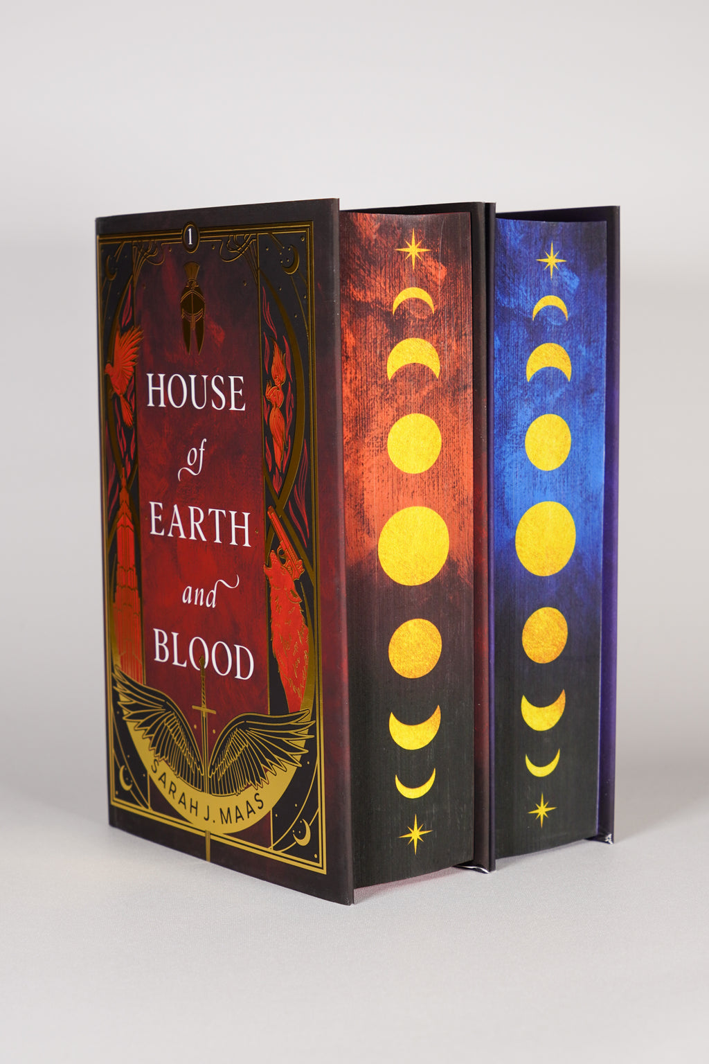 Digitally sprayed page edges on both FairyLoot Crescent City hardcovers