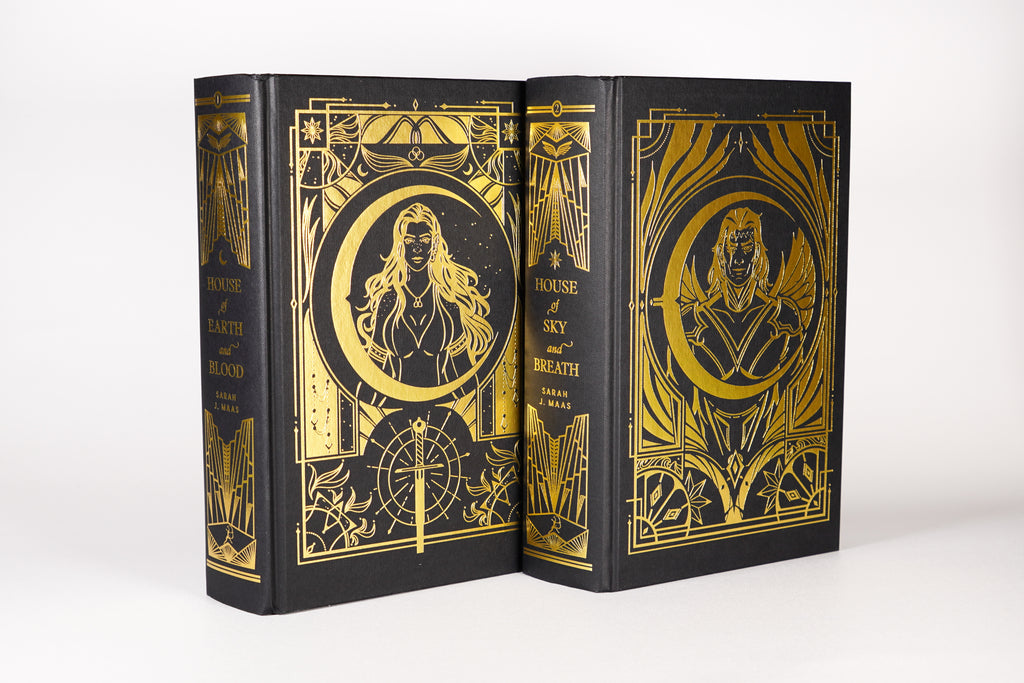 Character artwork and gold foil designs on the Crescent City FairyLoot hardcases