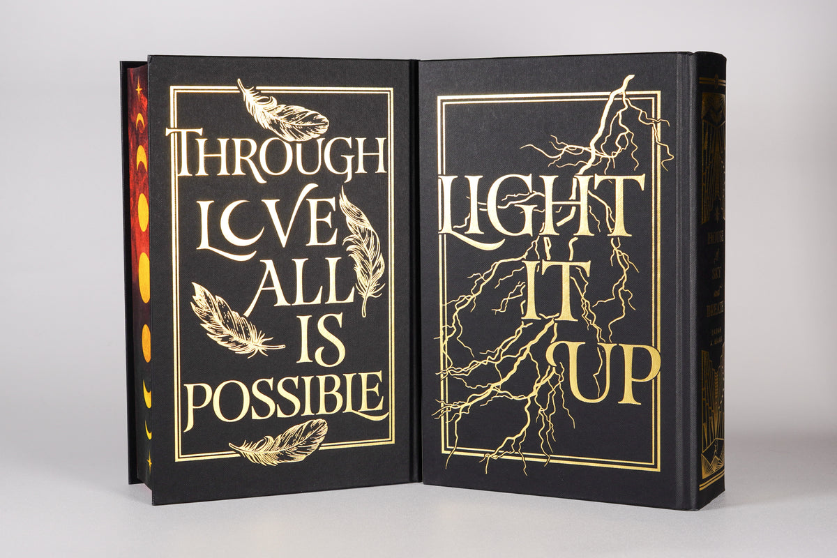 Quote designs on the backs of both Crescent City FairyLoot hardcases