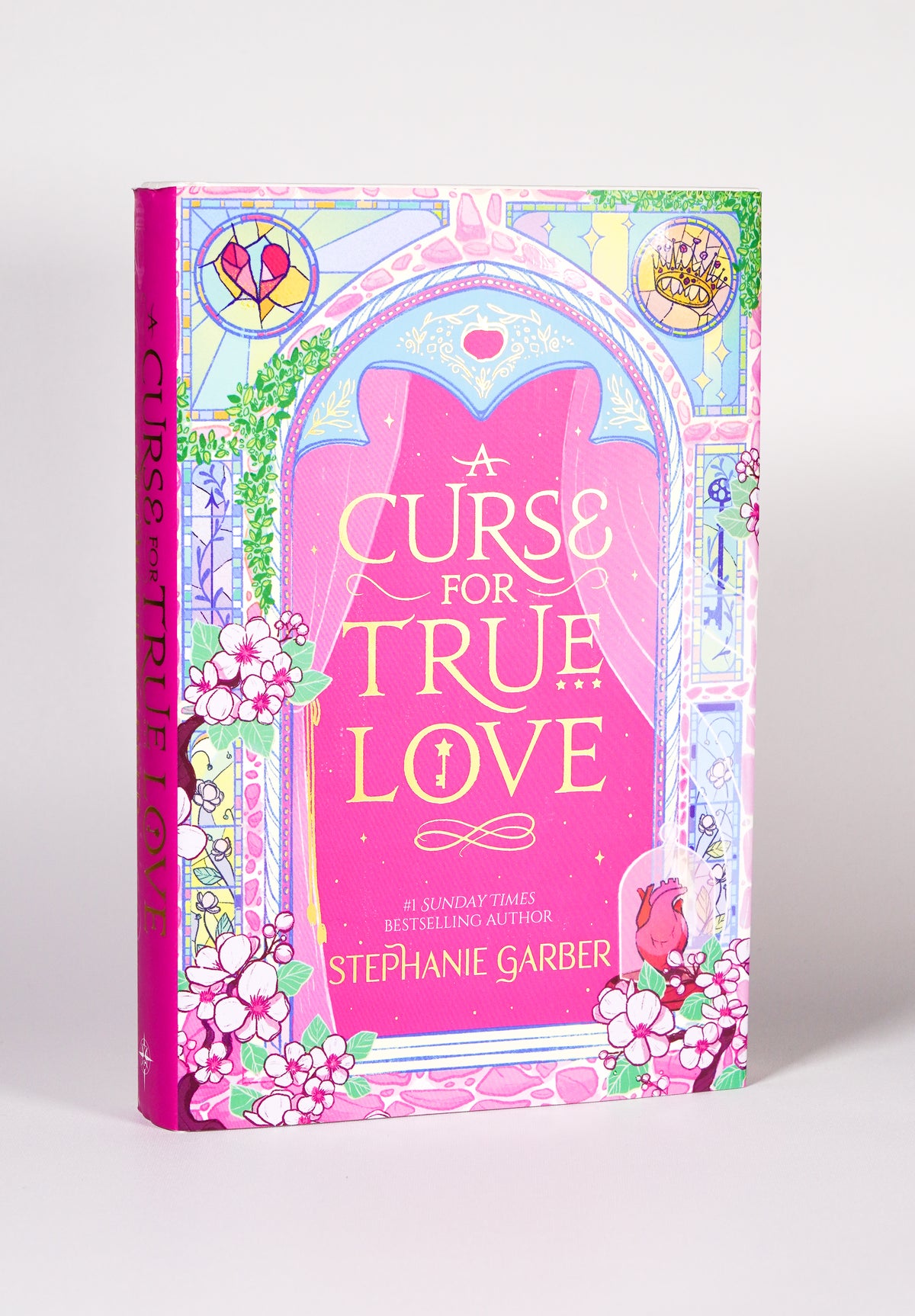 Front of A Curse for True Love UK Gollancz hardcover by Stephanie Garber
