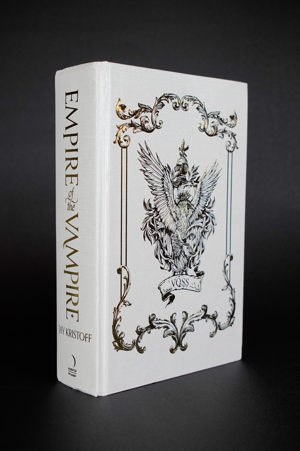 Empire of the Vampire Illumicrate: exposed front board and spine, showing compression at the spine ends and adjacent edge creasing
