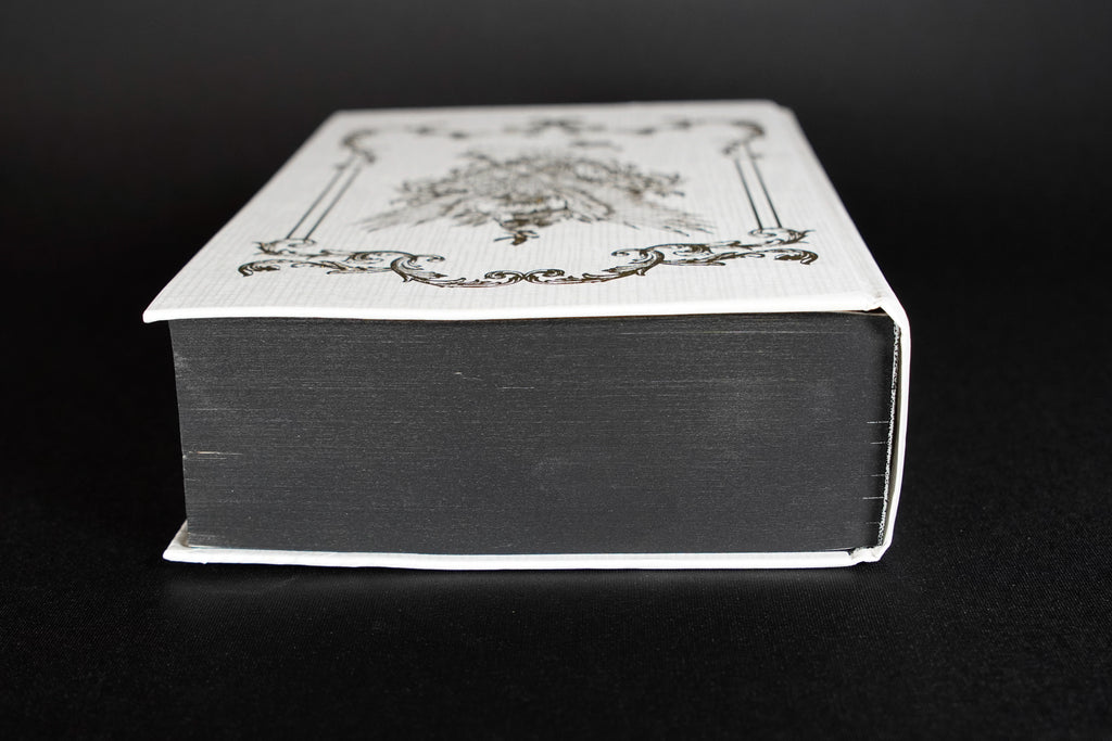 Empire of the Vampire Illumicrate: top edge view with jacket removed, showing damaged casing and board edges
