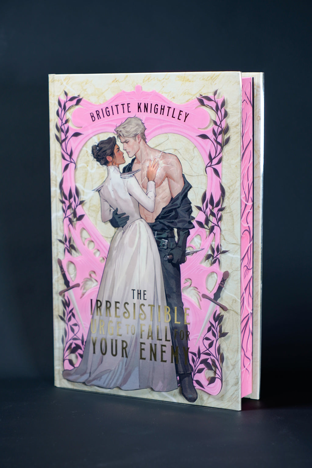 The Irresistible Urge to Fall for Your Enemy Illumicrate exclusive — front cover