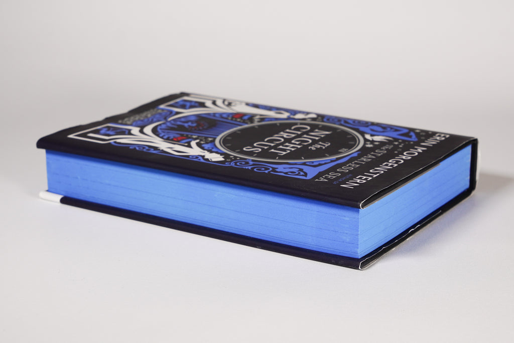 Bright blue sprayed page edges on The Night Circus Waterstones edition