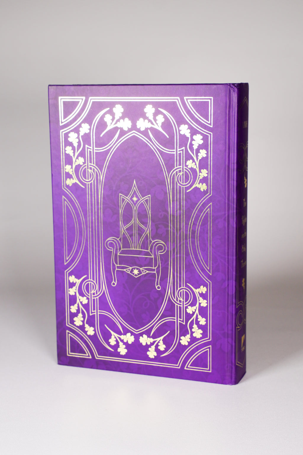 The Robin on the Oak Throne FairyLoot purple and gold back board with upper corner detail