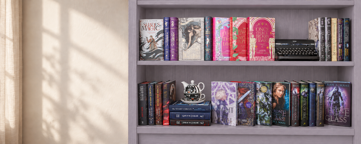 Wide muted lavender bookcase with fantasy books, vintage typewriter and tea set beside an ivory wall and linen curtain.