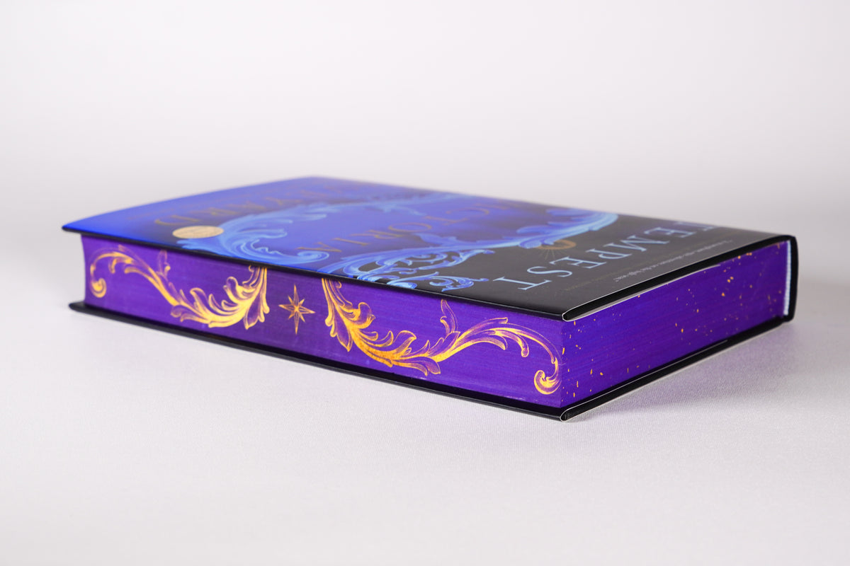 Purple and gold stenciled page edges on the Tempest deluxe edition