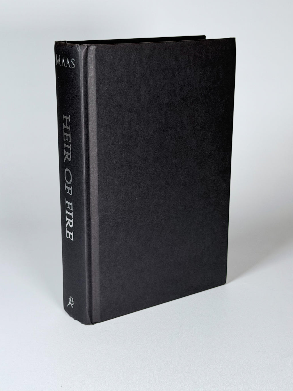 Heir of Fire: exposed black front board and spine