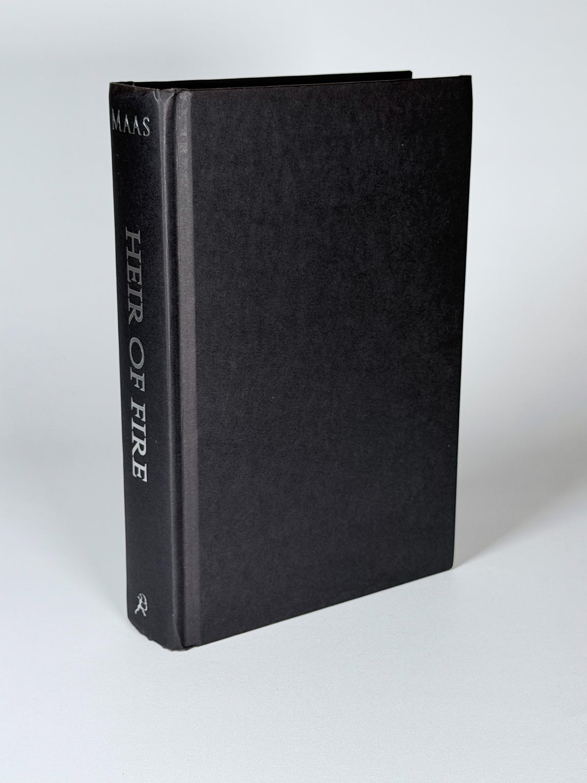 Heir of Fire: exposed black front board and spine