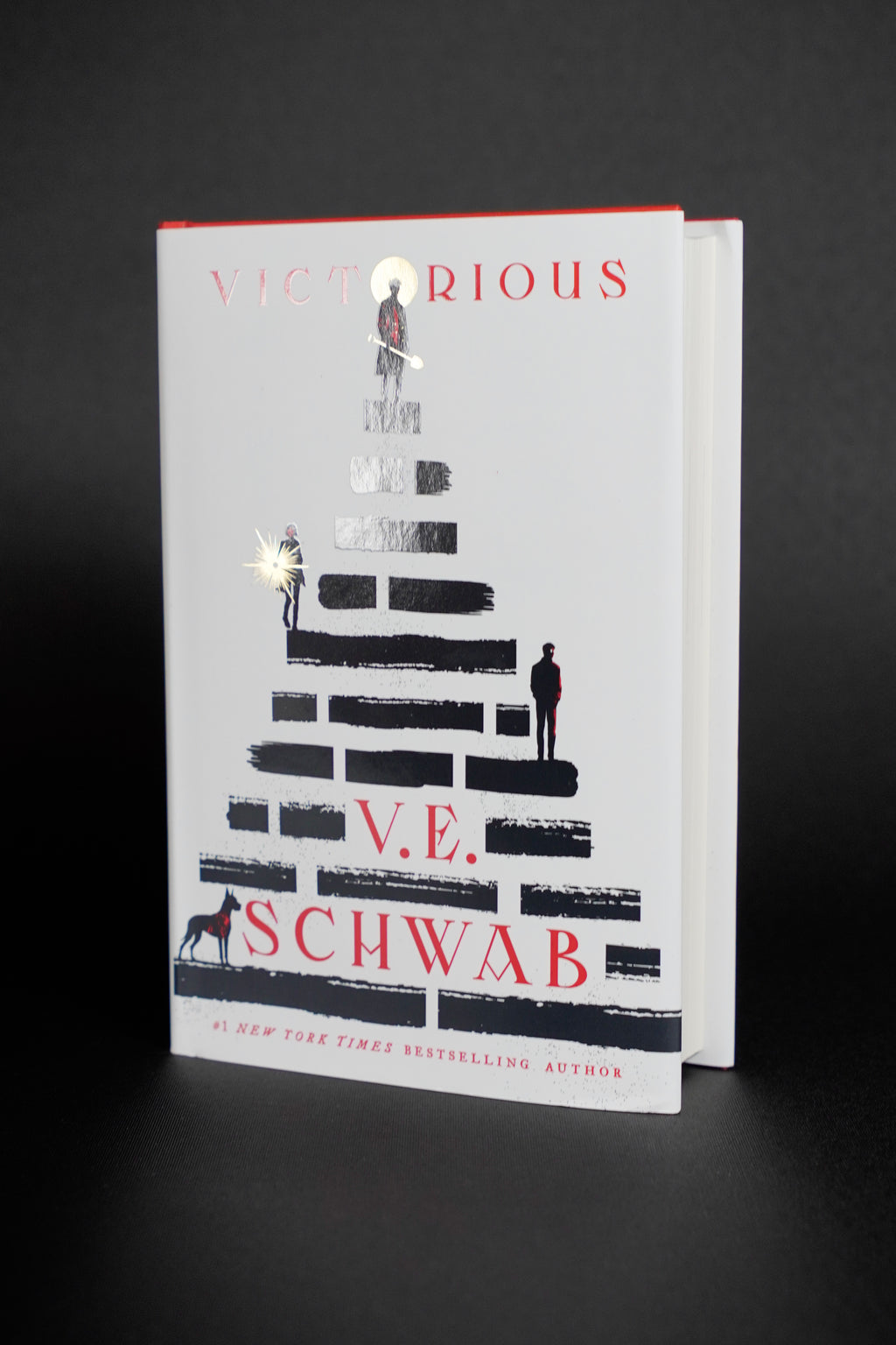 Victorious — signed Tor hardcover: white illustrated dust jacket front; actual copy