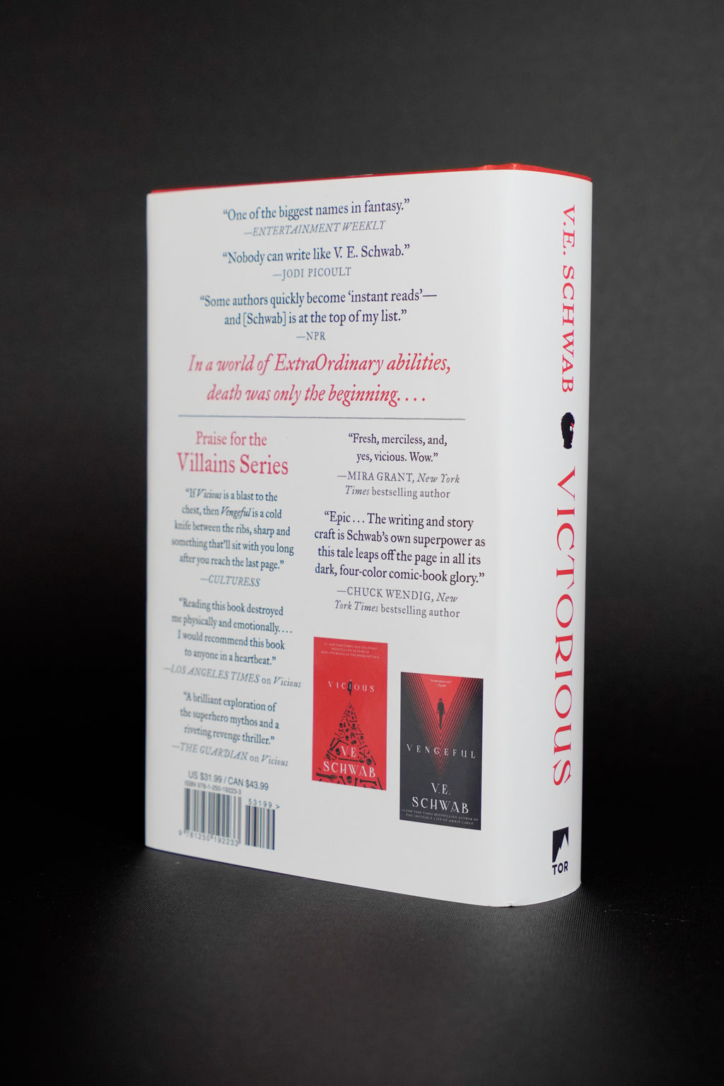 Victorious — signed Tor hardcover: dust jacket back and spine; actual copy