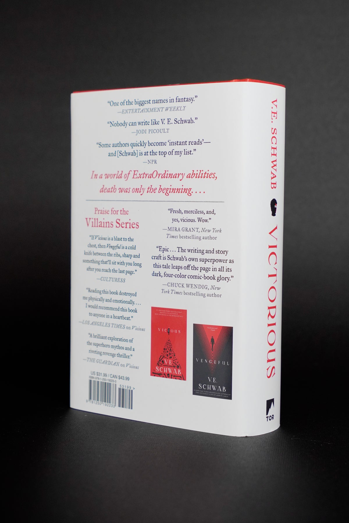 Victorious — signed Tor hardcover: dust jacket back and spine; actual copy
