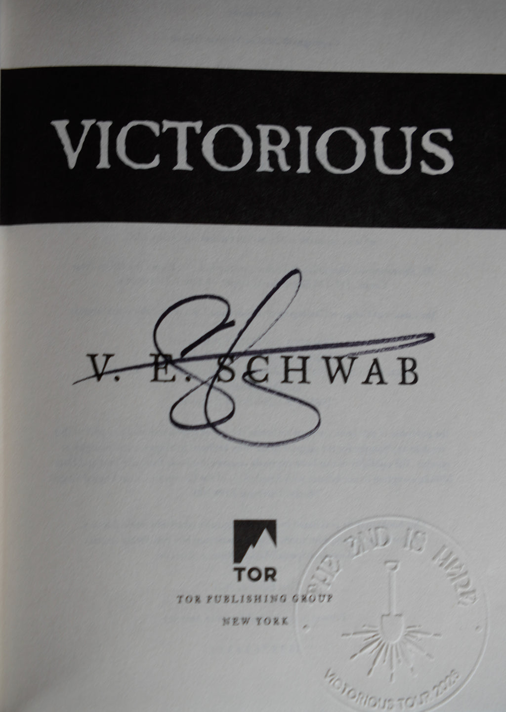 Victorious — signed Tor hardcover: hand-signed title page with embossed tour stamp; actual copy